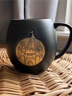 Black Ceramic Mug with Gold Cinderella’s Castle Emblem